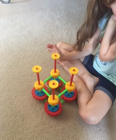 Girl Playing with Superstructs 2